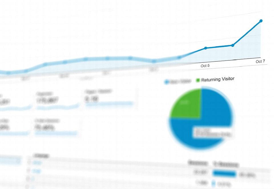 Abstract visualization of data analytics with graphs and charts showing dynamic growth. Abstract visualization of data analytics with graphs and charts showing dynamic growth.